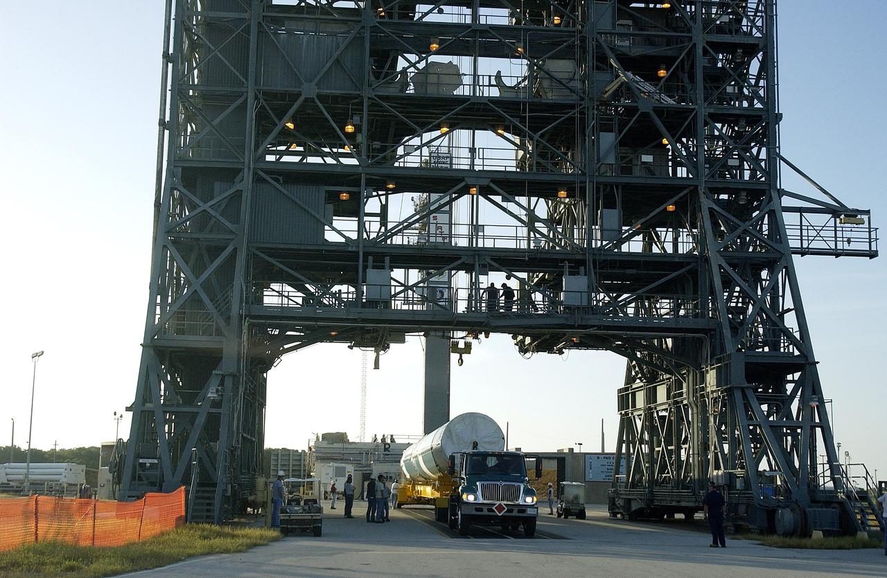 KENNEDY SPACE CENTER, FLA. -   On Launch Complex 17-B, Cape Canaveral Air Force Station, the first stage of a Delta II rocket arrives at the pad.  The rocket is