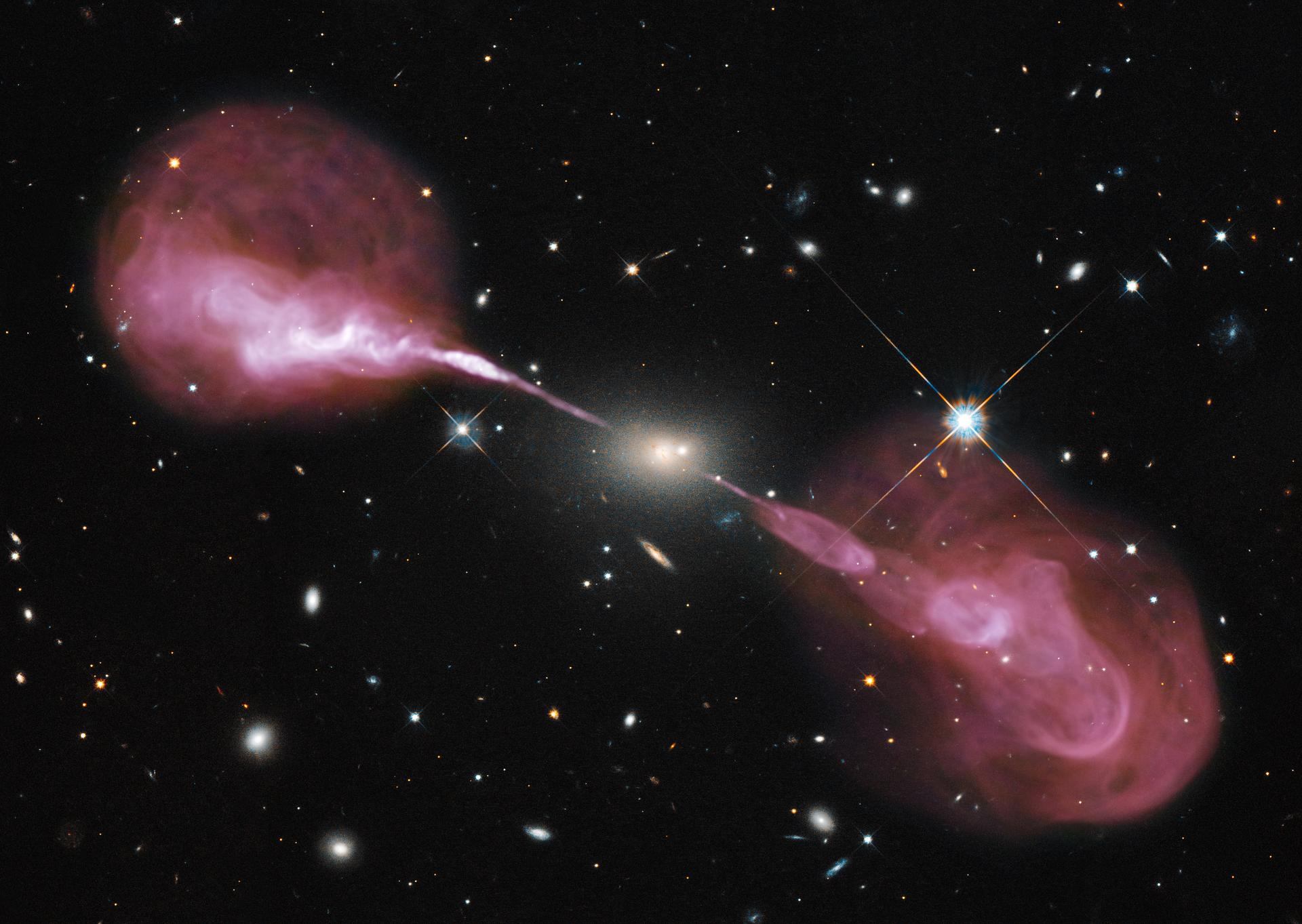 A Galaxy Shaped Like a Bow and Arrow Is Plowing a 1.8-Million-Light-Year Shockwave Through Space