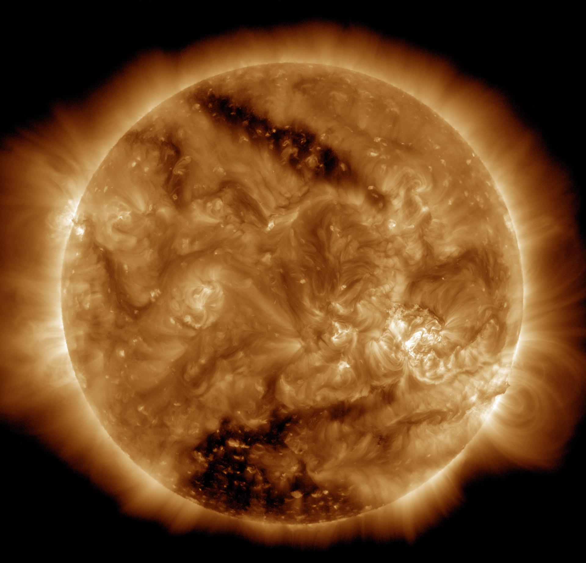 Coronal-Hole Wind and a Flaring Sunspot Set Up a G1 Aurora Window for Oct. 19-21