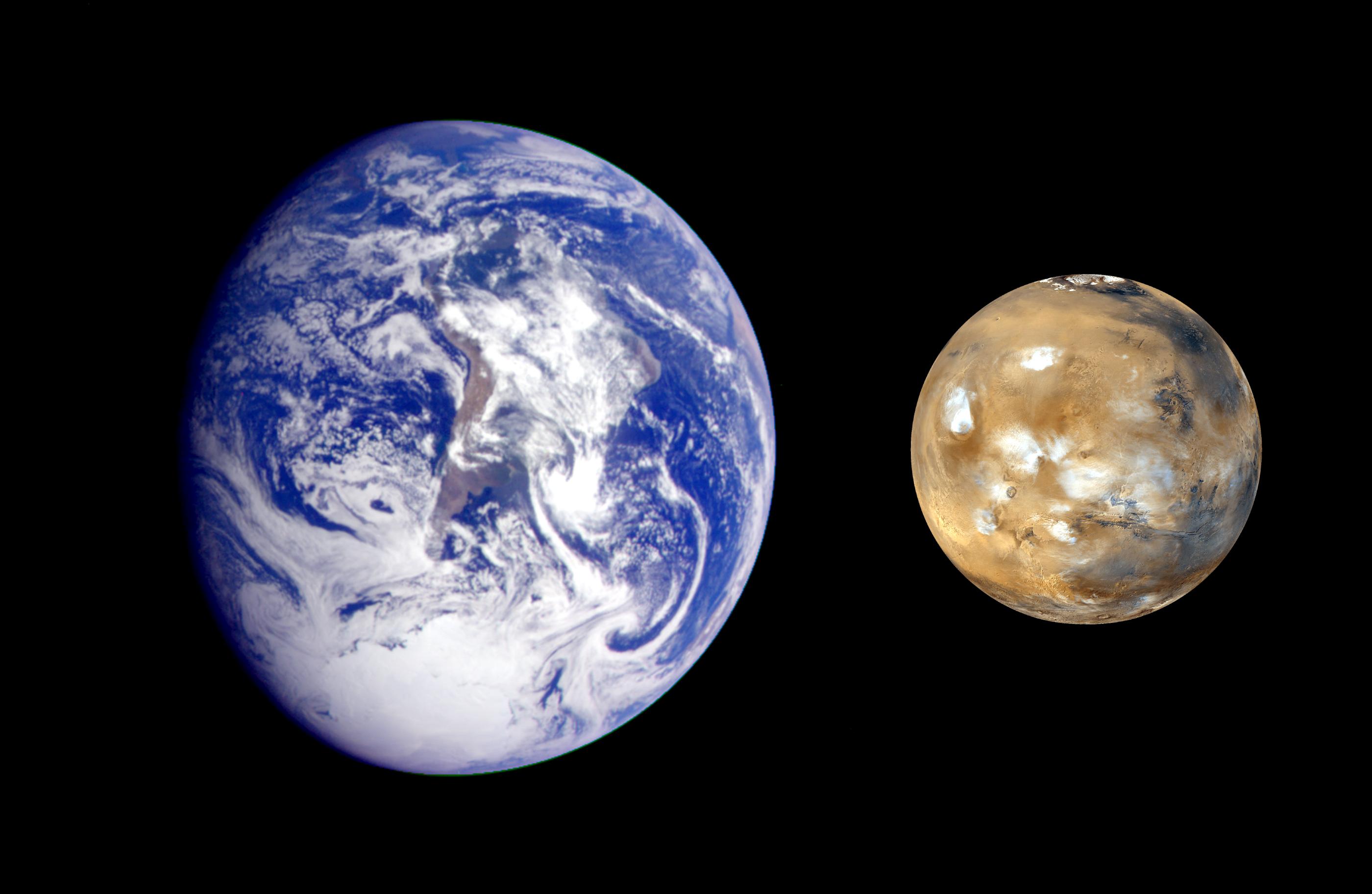 Earth and Mars Were Built Differently: Volatile Elements Point to a Hybrid Accretion Split