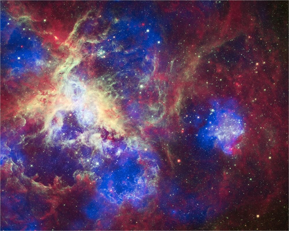 Three Space Telescopes Turn the Tarantula Nebula Into a Layered 'Craft' — and Solve an X-ray Mystery