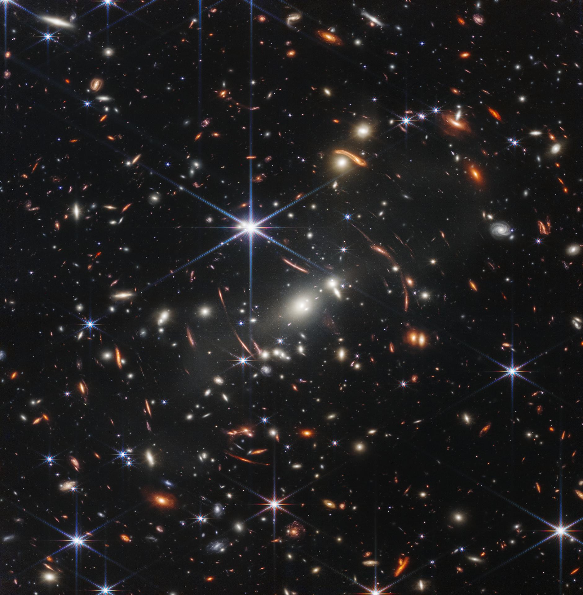 Webb's 'Cosmic House of Mirrors' Catches a Rare Lensing Trick Twice in One Cluster